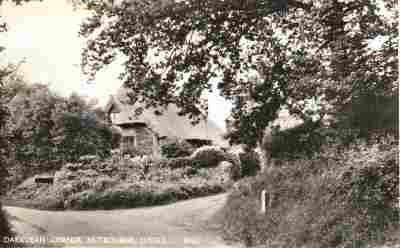 Darkdean, a seventeenth century thatched cottage at Nutbourne Place, pictured in around 1910