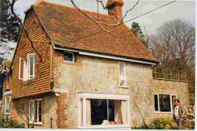 The Old Manor House at Nutbourne was extensively modernised in 1975, while occuped by Barrister John Lang and his wife Tessa. The picture is from 1975.